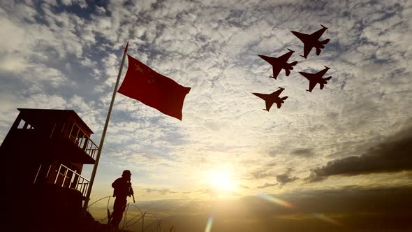 Chinese Soldier and Warplanes Show on the Border alt