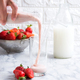 Strawberry juice poured into a glass with strawberries and milk - PhotoDune Item for Sale