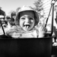 Portrait of a nine month old baby having fun on a swing - PhotoDune Item for Sale