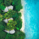 Aerial view of palms, bungalows, sandy beach, sea with waves - PhotoDune Item for Sale