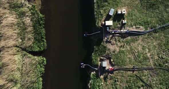 The Unit Pumps Water From The River To Irrigate The Field  alt