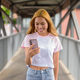 Portrait of beautiful Asian girl with blonde hair smiling and using mobile phone - PhotoDune Item for Sale
