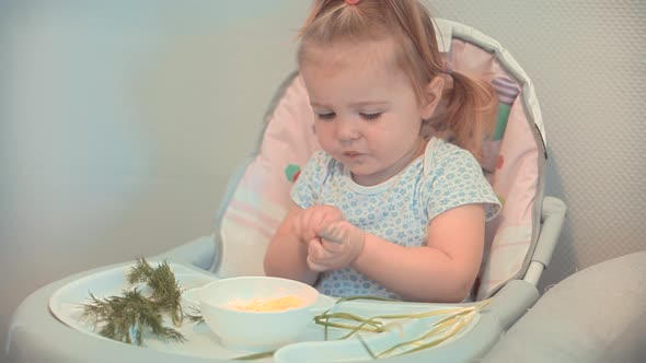 Little Children Sitting In Chair Kindergarten Eating Supplementary Healthy Food For Toddlers. alt