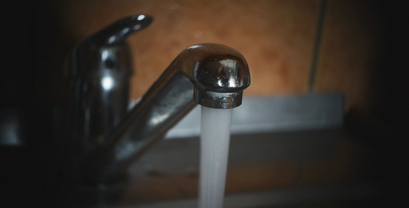 Water Pours From The Tap 1