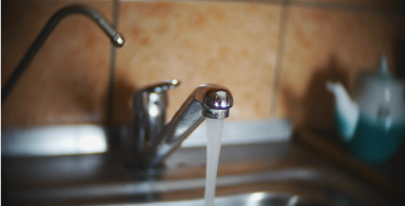 Water Pours From The Tap 2