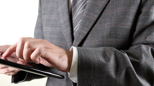 Business Man Holding A Digital Tablet