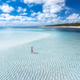 Aerial view of woman, sandbank in ocean, white sand, blue sea - PhotoDune Item for Sale