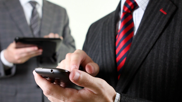 Business Men Using Smartphone And Digital Tablet