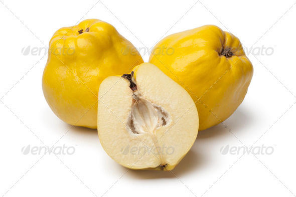 Fresh whole and half yellow Quinces - Stock Photo - Images