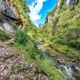 view of Turda Gorge (Cheile Turzii) natural reserve with marked trails for hikes on Hasdate river. - PhotoDune Item for Sale