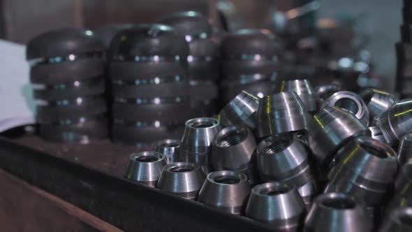 Close up of metal parts of a pipe fitting plant alt