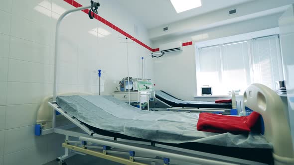 Empty Hospital Ward with Respiratory Equipment alt
