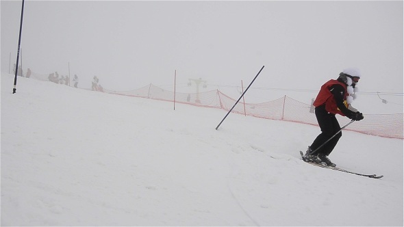 Skiers Riding On Slope 1