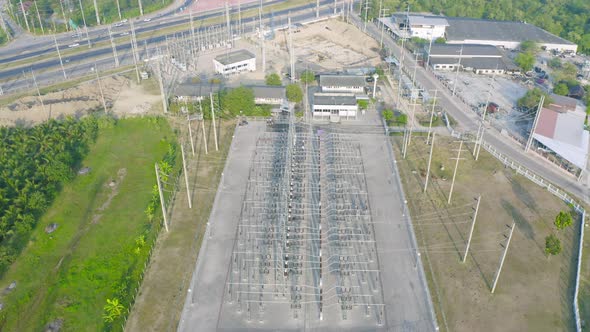 Aerial view of electricity generating, voltage poles. Power lines on utility tower and cable wires alt