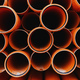 Plastic water pipes stacked outdoor on rainy day - PhotoDune Item for Sale