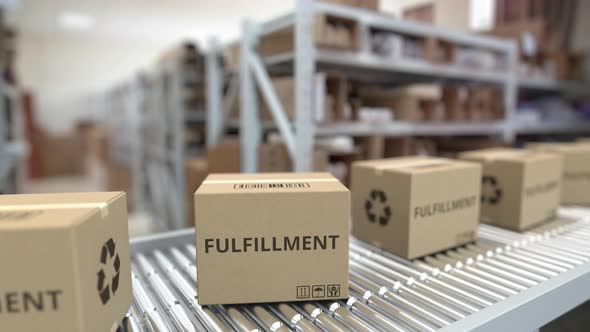 Cardboard Boxes with FULFILLMENT Text on Conveyor alt