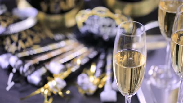 New Year Eve party with champagne and chocolates. alt