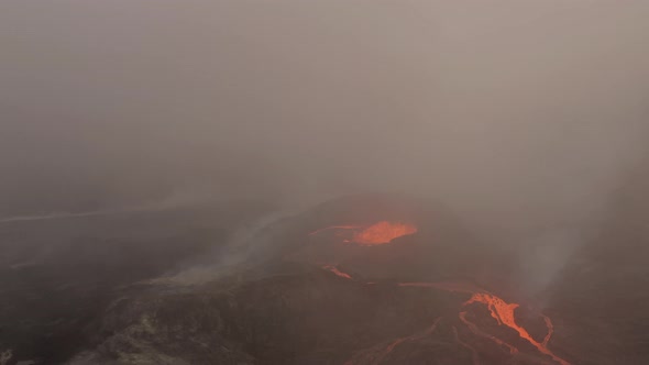 Clouds Of Smoke From An Erupting Volcano With Boiling Molten Lava. - Aerial Shot alt