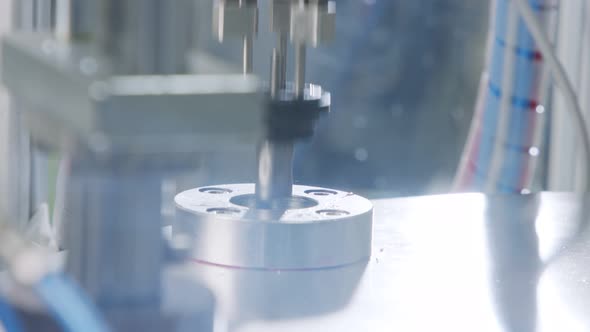 Advanced robotic machine manufacturing parts in an automated assembly line alt