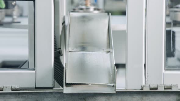 Advanced robotic machine manufacturing parts in an automated assembly line alt