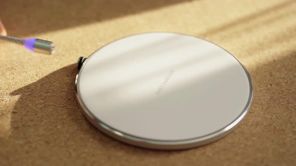 Connect Magnetic Cable To Wireless Charger and Charger Lights Up Indicating Success Connection
