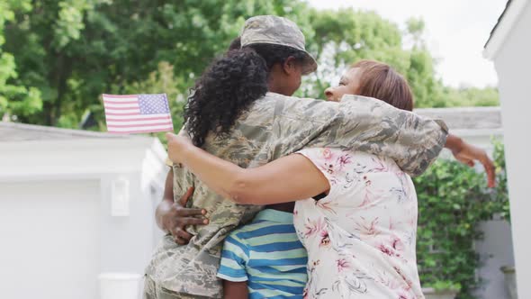 Video of african american family welcoming soldier mother after returning home alt
