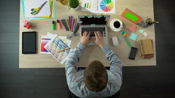 Designer Takes Frame With Green Screen Working Inspired by Picture Top View alt