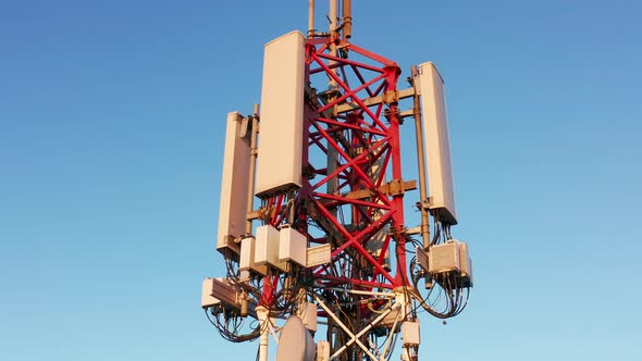 Telecommunications tower carrying broadcasting antennas for 3G, 4G and 5G cellular networks. alt