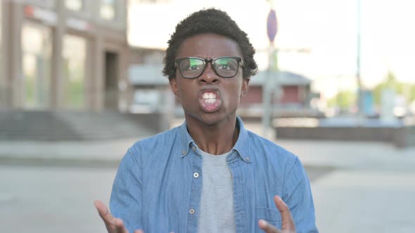 Angry Young African Man Fighting Outdoor alt