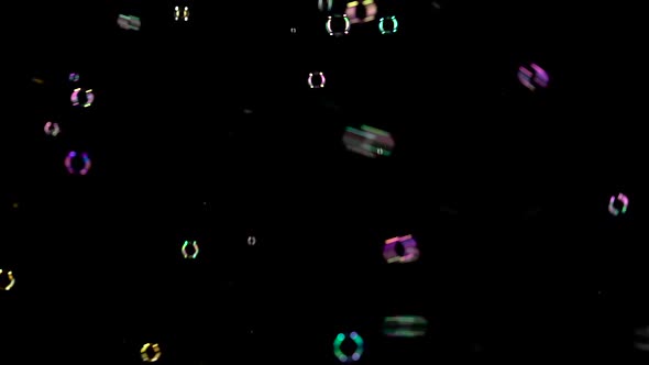 Floating Soap Bubbles in the Air. Black Backgroungs alt