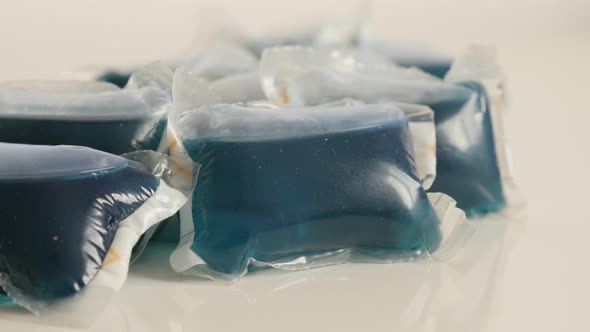 Slow tilt on liquid ultra-concentrated detergent on white background   4K 2160p 30fps UltraHD footag alt