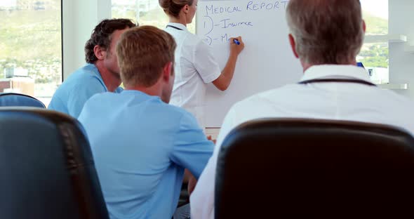 Medical team having medical report alt