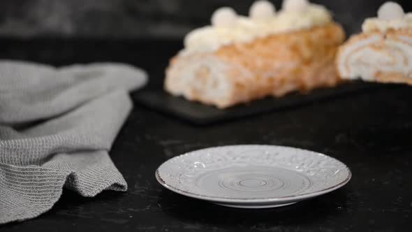 Delicious Meringue Cake Roll Slice On A Plate.	 alt