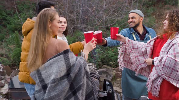 Friends Having a Barbecue Party in Backyard at Autumn