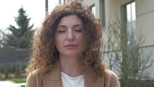 Portrait of a Beautiful Middleaged Woman alt