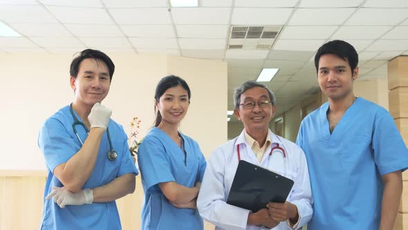 Portrait of a successful medical team at work in hospital expertise alt