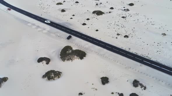 Aerial footage of a road in a desert