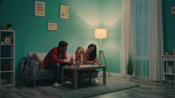 Parents and Child Entertain at Home alt