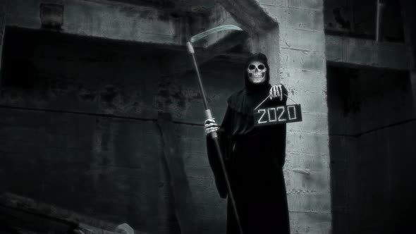 Death with a Scythe Raises a Sign with the Inscription 2020 alt