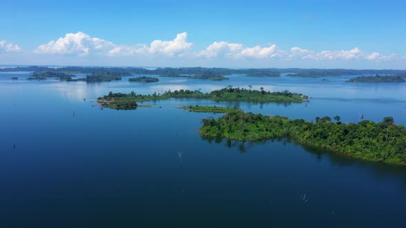 Drone Flying Over A Large Blue Lagoon, With Islands Full Of Green Trees, Paradise In Brazil