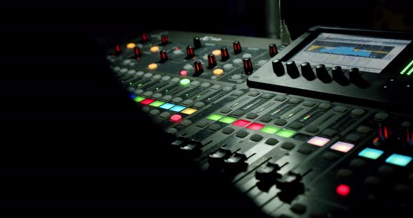 Sound Producer Hand Is Using a Music Mixer with Editing Tools in Concert. V3 alt