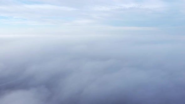 Aerial Drone View Flight Over Fog alt