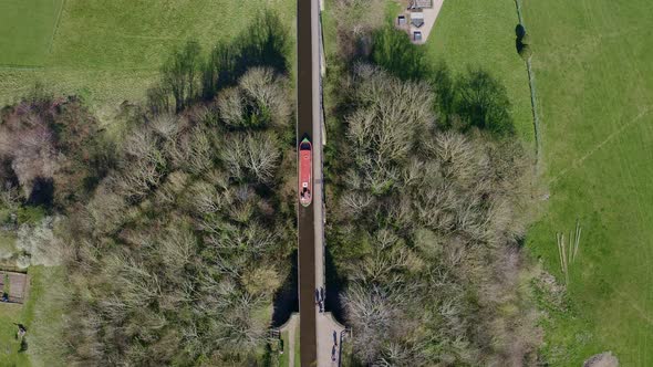 A Narrow Boat Crossing the Pontcysyllte Aqueduct famously designed by Thomas Telford,  located in th alt