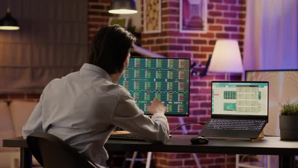 Hedge Fund Trader Analyzing Real Time Stock Market Statistics alt