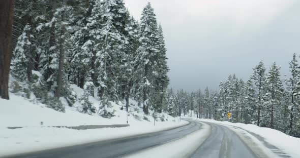 Driving on mountain road in winter