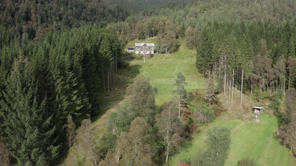 Aerial shot getting Close to abandoned farm Surrounded by Nature - Norway alt