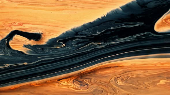 Yellow and Black Psychedelic Patterns of Multi-colored Paints Mixed with Each Other. alt