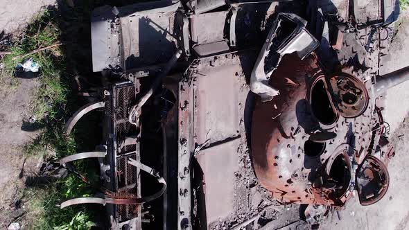 Vertical Video of a Burnt Military Equipment During the War in Ukraine alt