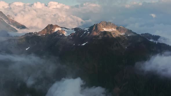 Flying Through Clouds Above Mountain Tops in Paradise Heaven Eternity Landscape alt