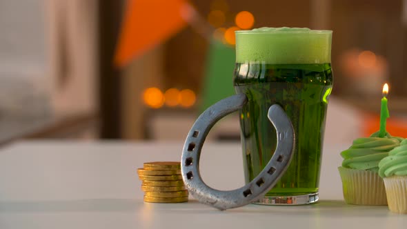 Glass of Beer, Cupcakes, Horseshoe and Gold Coins alt